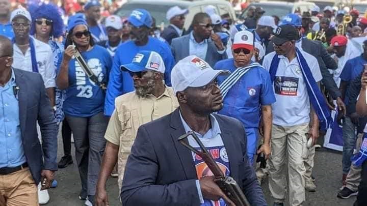 ARMED PRESIDENTIAL SECURITIES WEAR RULING PARTY’S SHIRTS AT WEAH’S NOMINATION RALLY