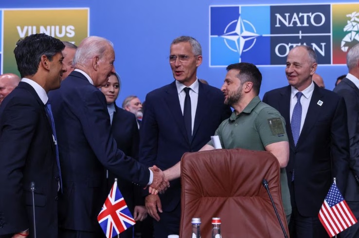NATO ALLIES OFFER UKRAINE SECURITY ASSURANCES AS BIDEN HITS OUT AT ‘CRAVEN’ PUTIN